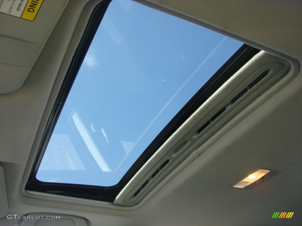 2009 Mazda MAZDA3 i Sport Sedan Sunroof Photo #65706878