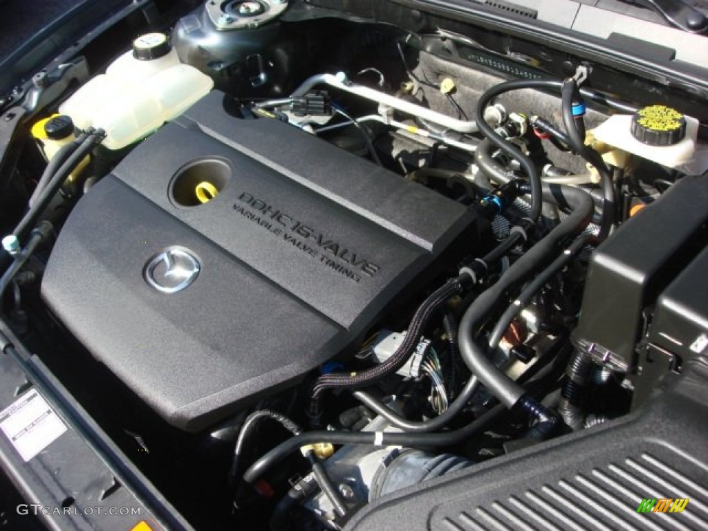 2009 Mazda MAZDA3 i Sport Sedan 2.0 Liter DOHC 16-Valve VVT 4 Cylinder Engine Photo #65706908