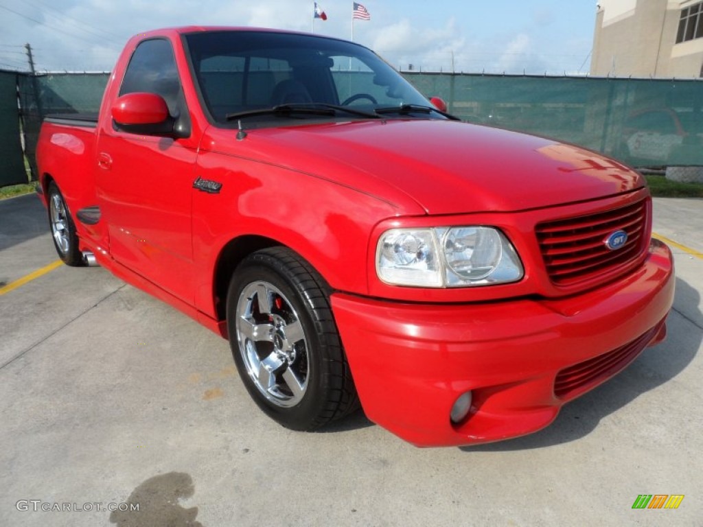 Bright Red 2001 Ford F150 SVT Lightning Exterior Photo #65723168