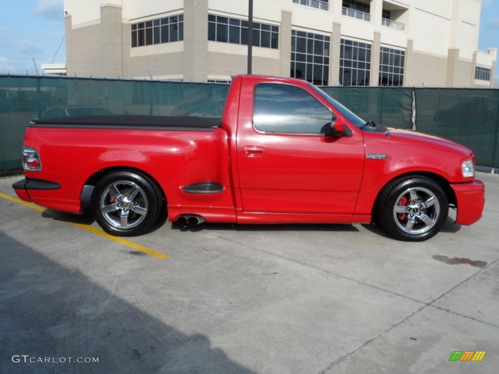 Bright Red 2001 Ford F150 SVT Lightning Exterior Photo #65723173