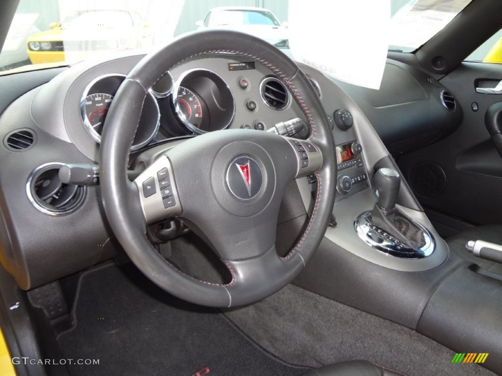 2007 Pontiac Solstice GXP Roadster Ebony Steering Wheel Photo #65741272