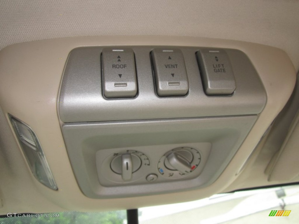 2004 Navigator Luxury - Merlot Red Metallic / Light Parchment photo #24