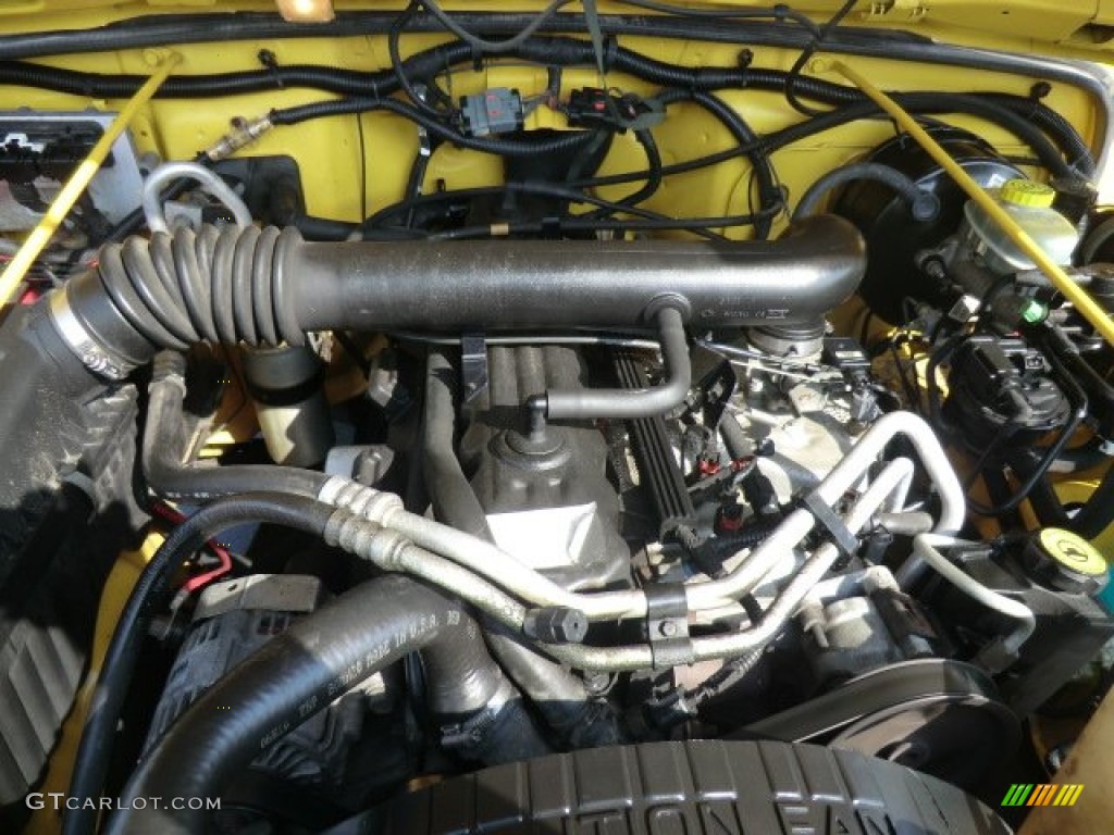 2002 Wrangler Sport 4x4 - Solar Yellow / Agate Black photo #18