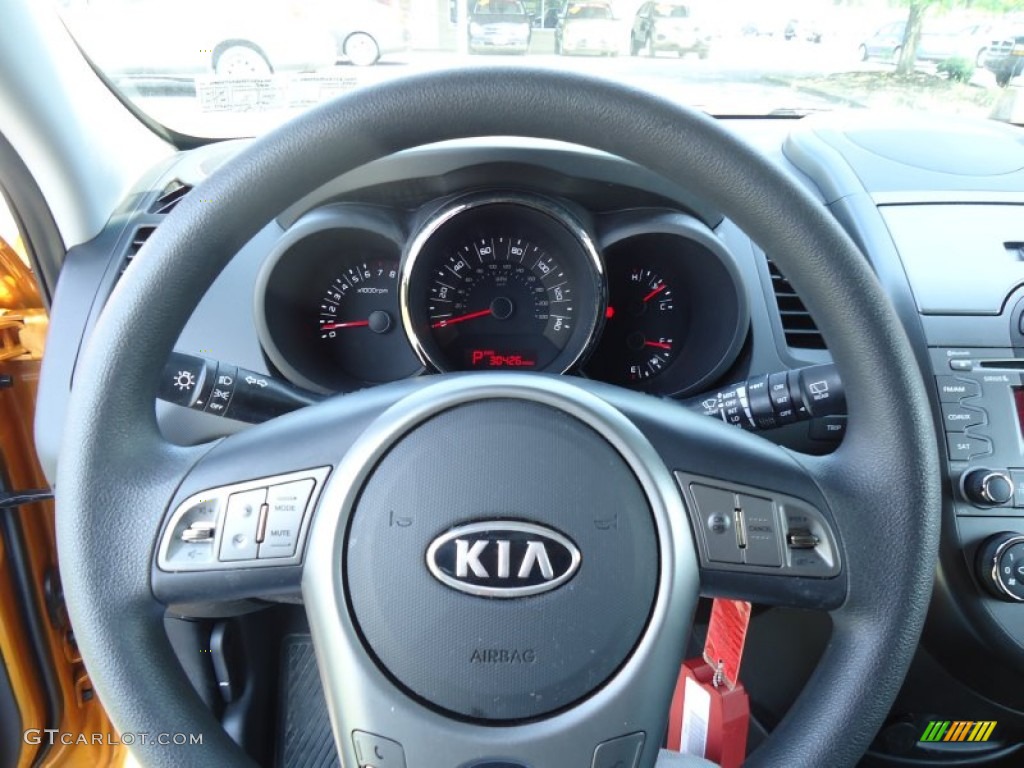 2011 Kia Soul + Black Soul Logo Cloth Steering Wheel Photo #65781176