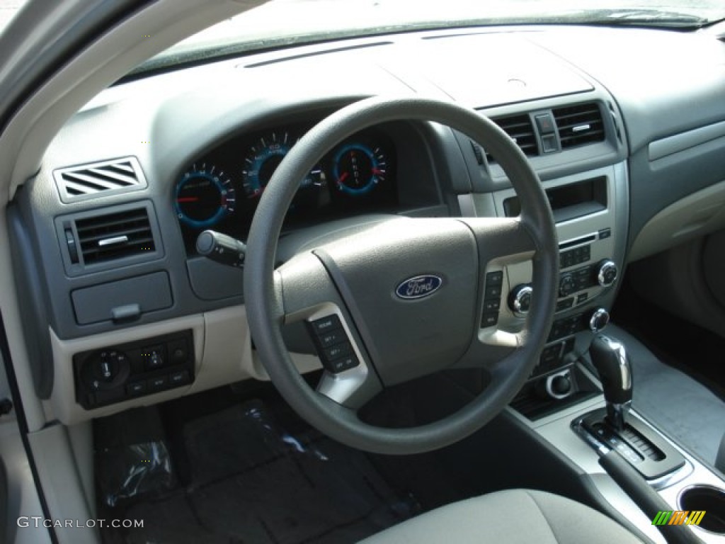 2010 Ford Fusion SE Medium Light Stone Steering Wheel Photo #65791619