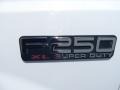 2003 Ford F250 Super Duty XL SuperCab 4x4 Badge and Logo Photo