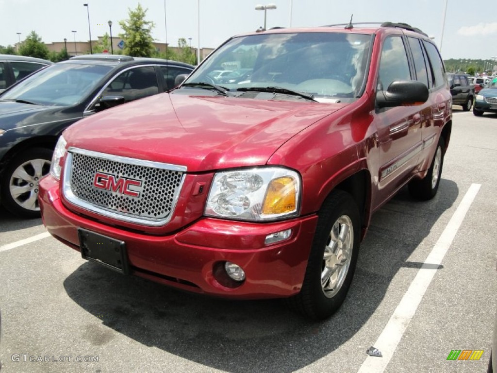 2004 Envoy SLE - Magnetic Red Metallic / Medium Pewter photo #44