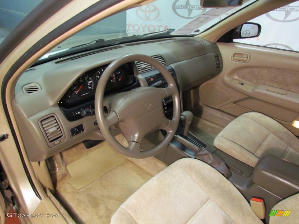1998 Maxima  - Pebble Beige Metallic / Beige photo #12