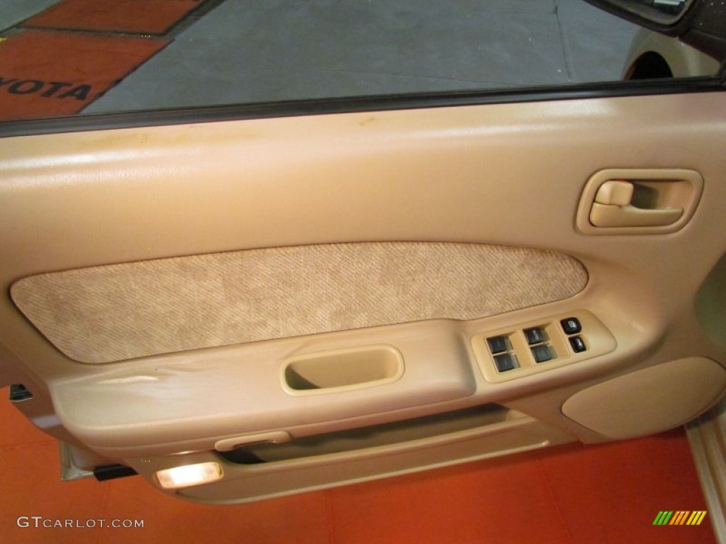 1998 Maxima  - Pebble Beige Metallic / Beige photo #13