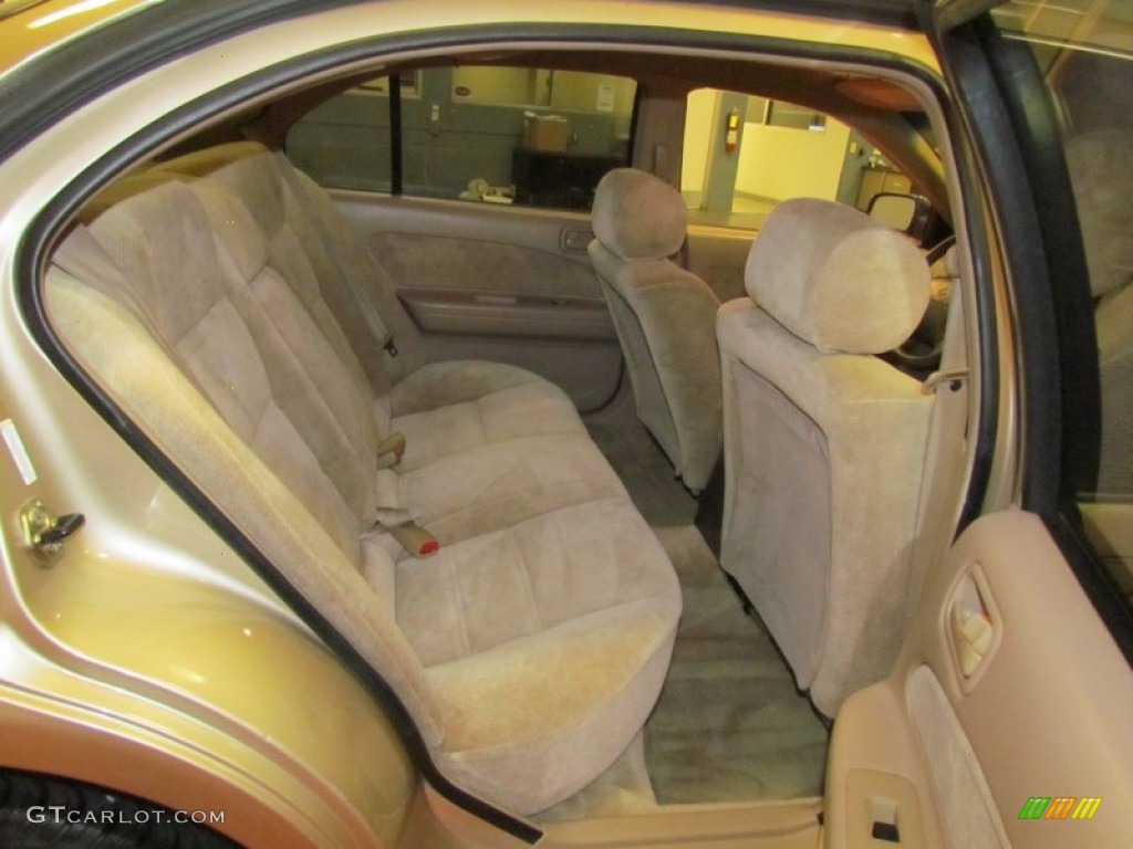 1998 Maxima  - Pebble Beige Metallic / Beige photo #22