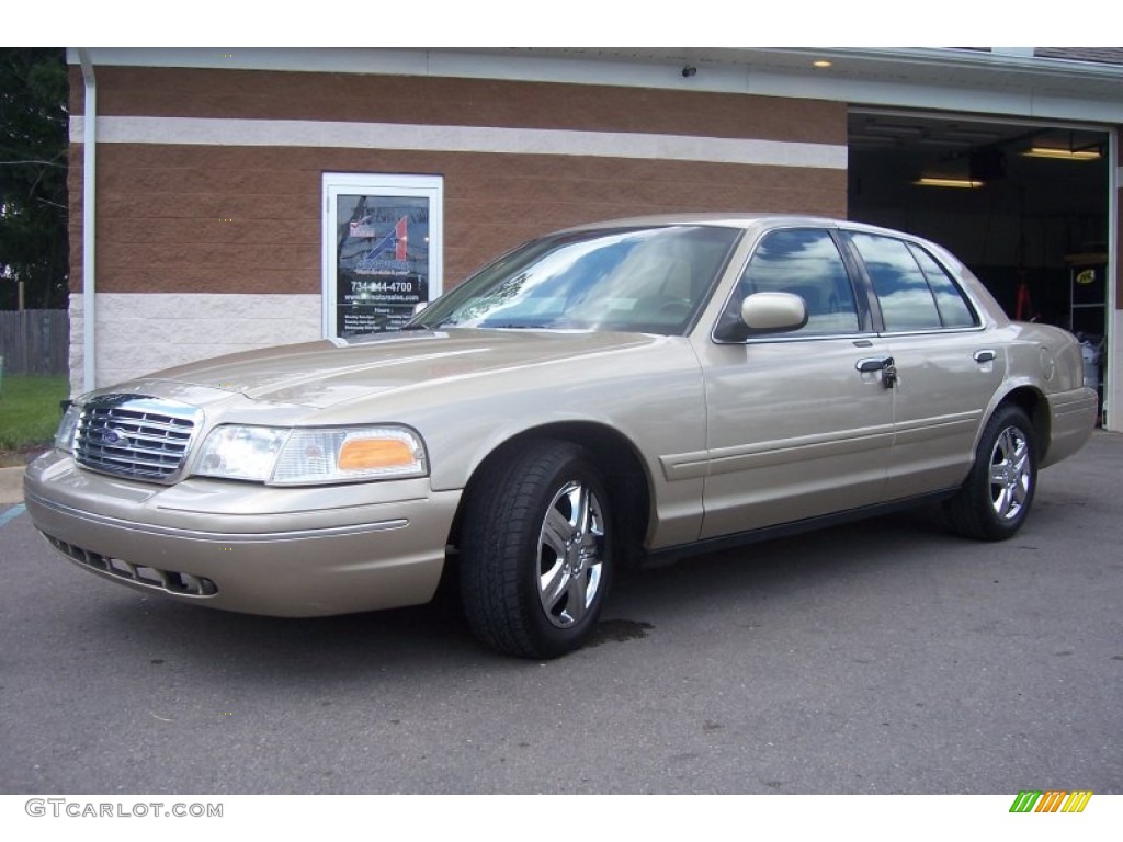 2000 Crown Victoria Sedan - Harvest Gold Metallic / Medium Parchment photo #1