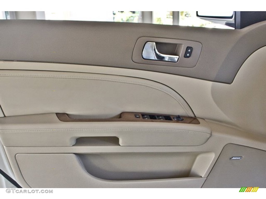 2011 Cadillac STS V6 Sport Cashmere/Dark Cashmere Door Panel Photo #65857503