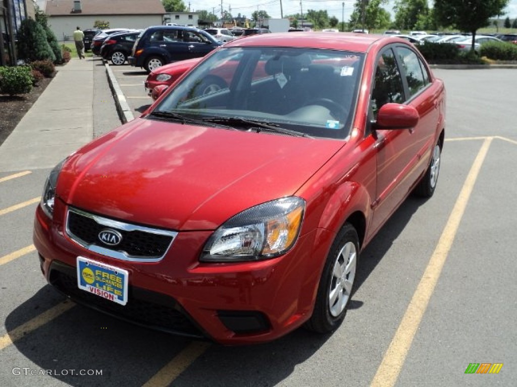 Tropical Red Kia Rio