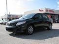 2009 Black Sand Pearl Toyota Corolla LE  photo #2