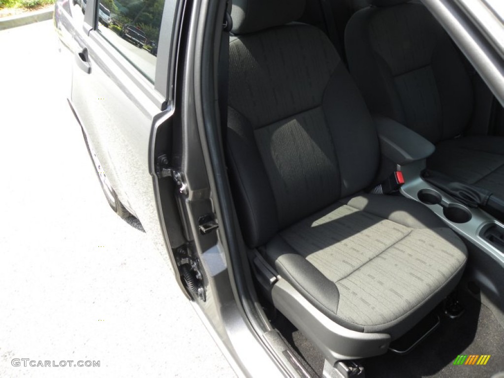 2011 Focus SE Sedan - Sterling Gray Metallic / Medium Stone photo #8