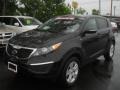 2012 Black Cherry Kia Sportage LX AWD  photo #1