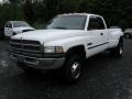 Front 3/4 View of 2000 Ram 3500 SLT Extended Cab 4x4 Dually