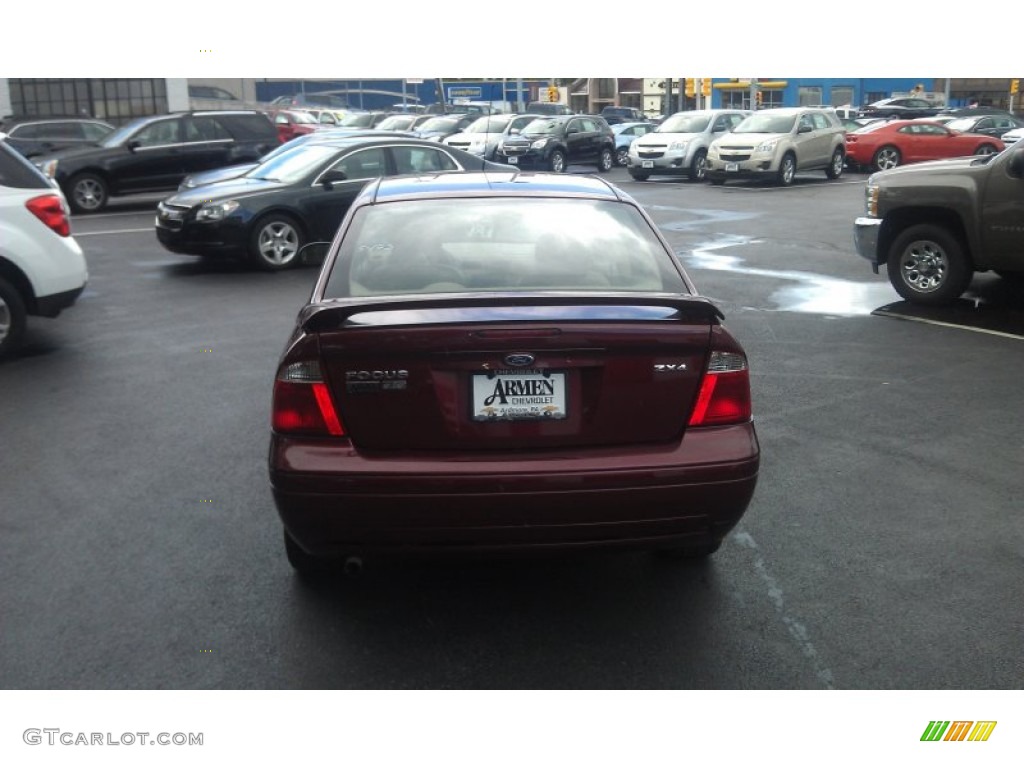 2004 Focus ZTS Sedan - Sangria Red Metallic / Medium Parchment photo #3