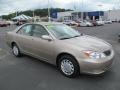 2003 Desert Sand Mica Toyota Camry LE  photo #1