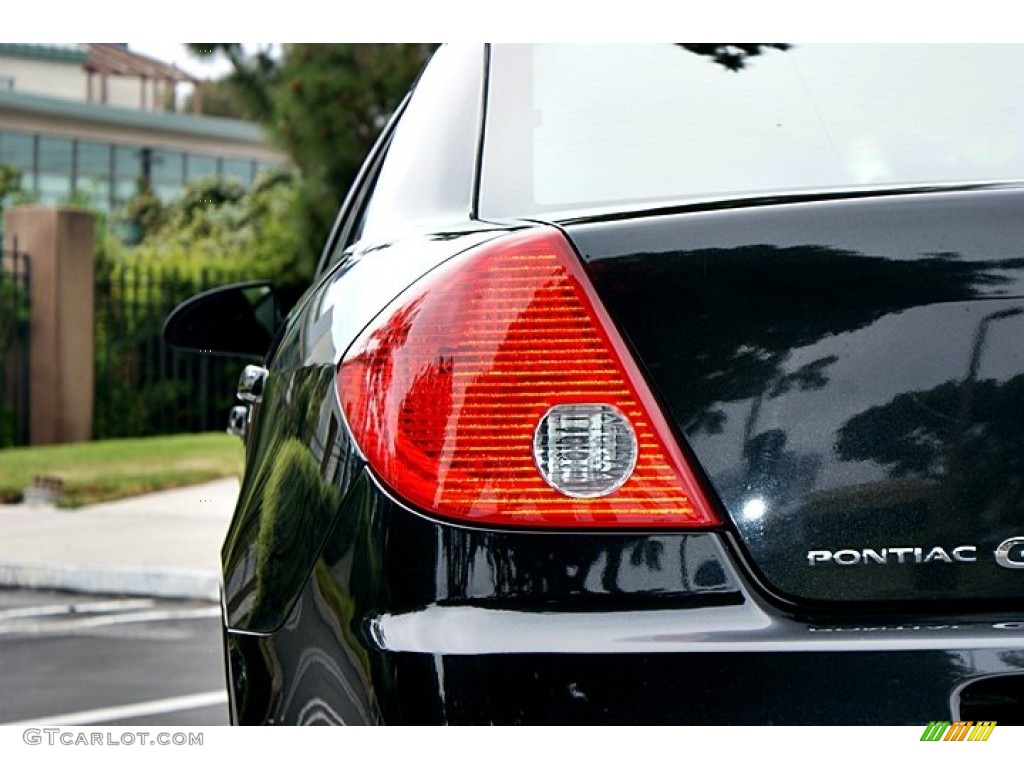 2010 G6 Sedan - Carbon Black Metallic / Ebony photo #7