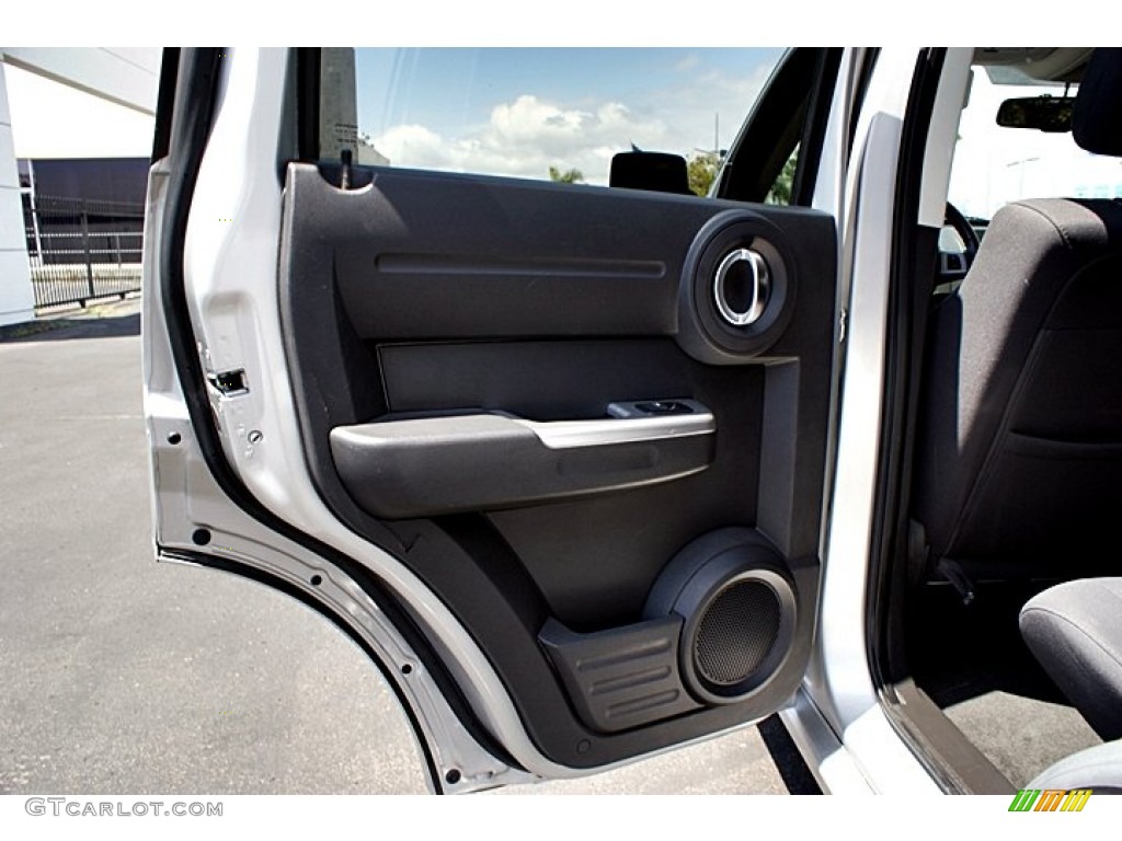 2011 Dodge Nitro SXT Dark Slate Gray Door Panel Photo #66146459