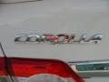 2011 Toyota Corolla S Badge and Logo Photo