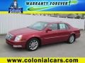 2010 Crystal Red Tintcoat Cadillac DTS   photo #1