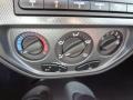 2005 Ford Focus Charcoal/Red Interior Controls Photo