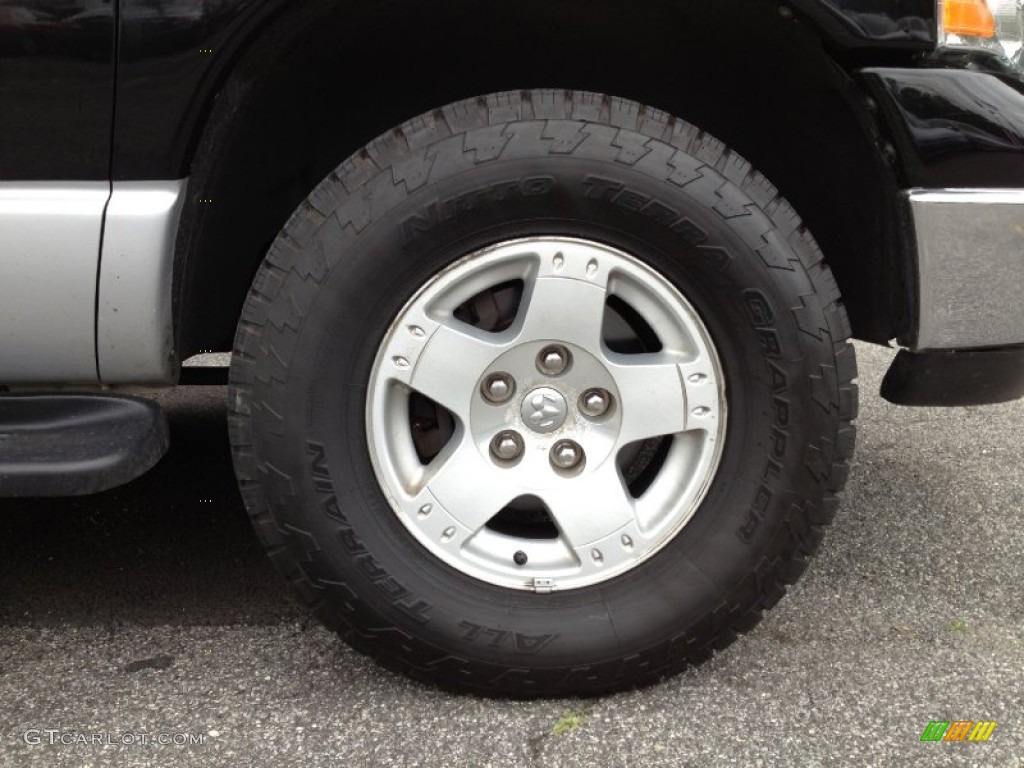 2005 Ram 1500 SLT Quad Cab 4x4 - Black / Dark Slate Gray photo #11