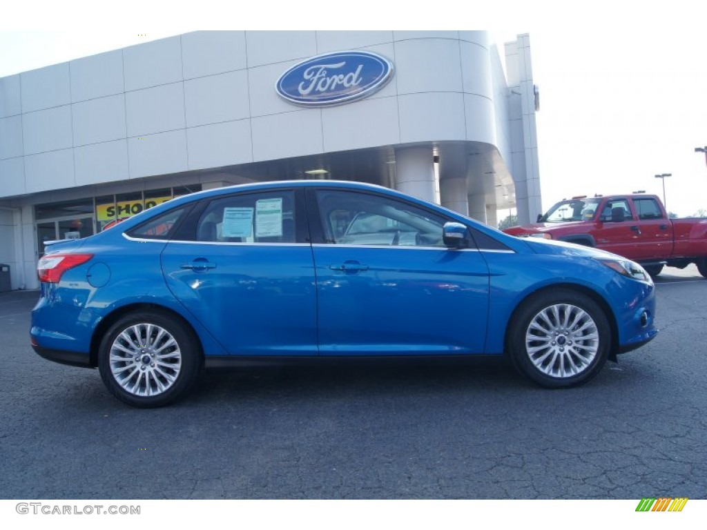 Blue Candy Metallic 2012 Ford Focus Titanium Sedan Exterior Photo #66199231