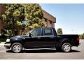 2002 Black Ford F150 Lariat SuperCrew  photo #8