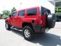 2009 Victory Red Hummer H3   photo #3