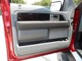 Platinum Steel Gray/Black Leather Door Panel Photo for 2012 Ford F150 #66250760