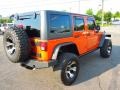 2011 Mango Tango Pearl Jeep Wrangler Unlimited Rubicon 4x4  photo #4