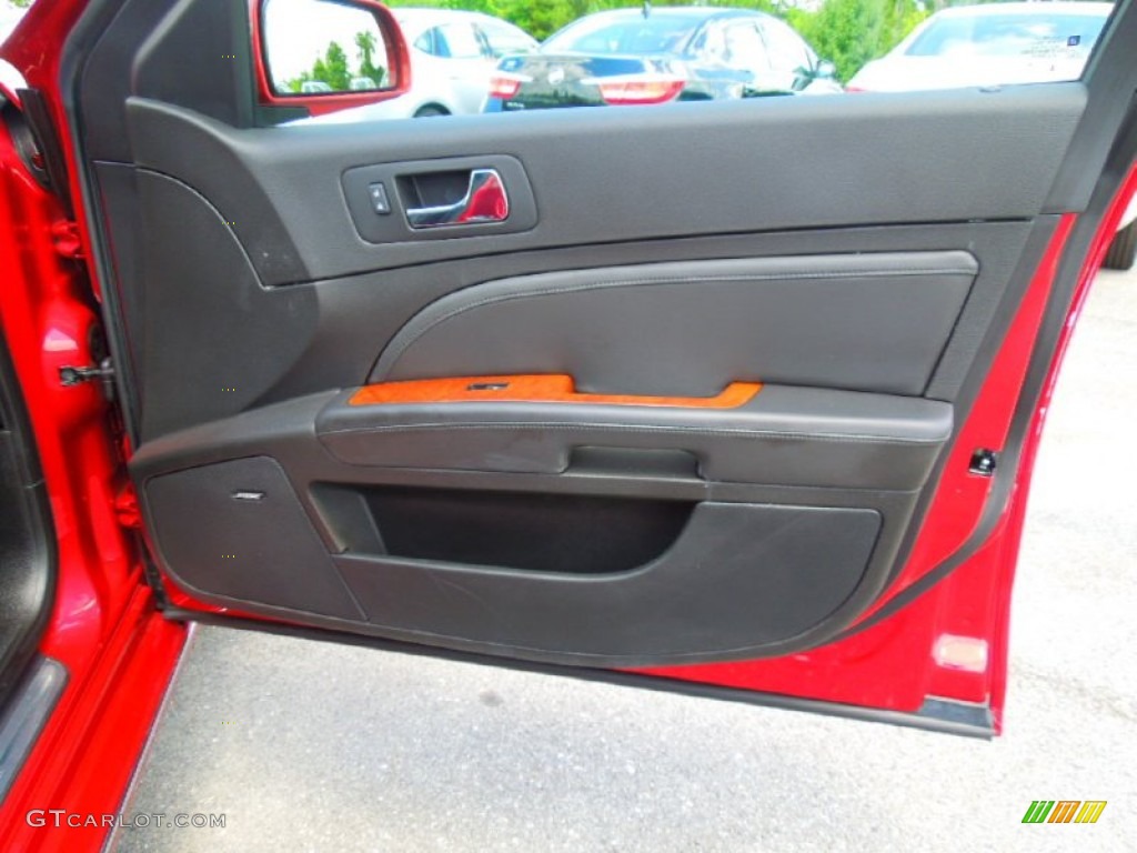 2011 Cadillac STS V6 Premium Ebony Door Panel Photo #66276578