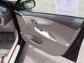Bisque 2010 Toyota Corolla LE Door Panel