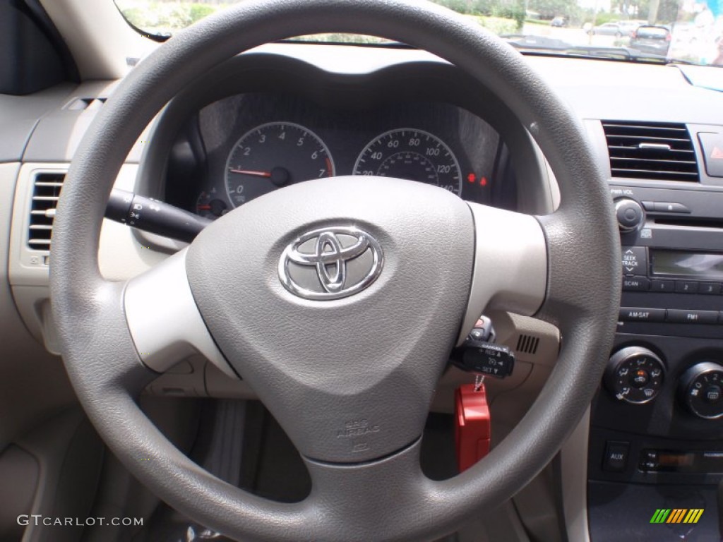 2010 Toyota Corolla LE Bisque Steering Wheel Photo #66301670