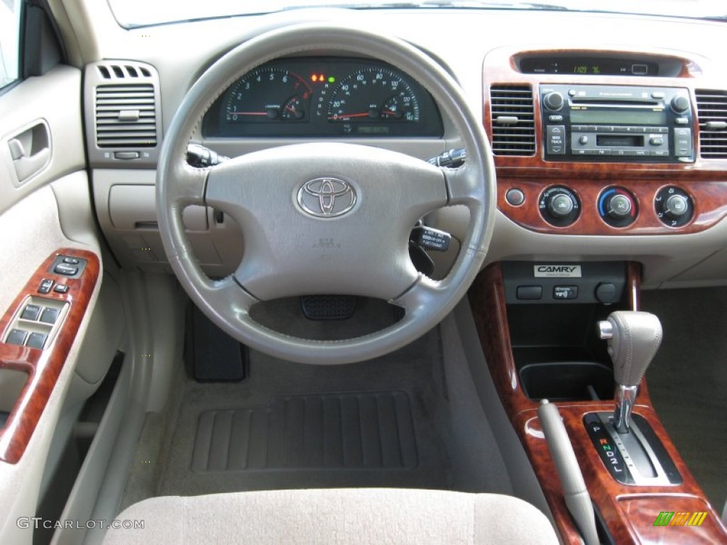 2004 Camry LE - Crystal White / Taupe photo #26