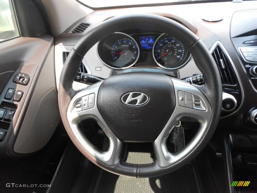 2012 Hyundai Tucson GLS Taupe Steering Wheel Photo #66312350