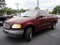 1999 Dark Toreador Red Metallic Ford F150 XLT Extended Cab  photo #30