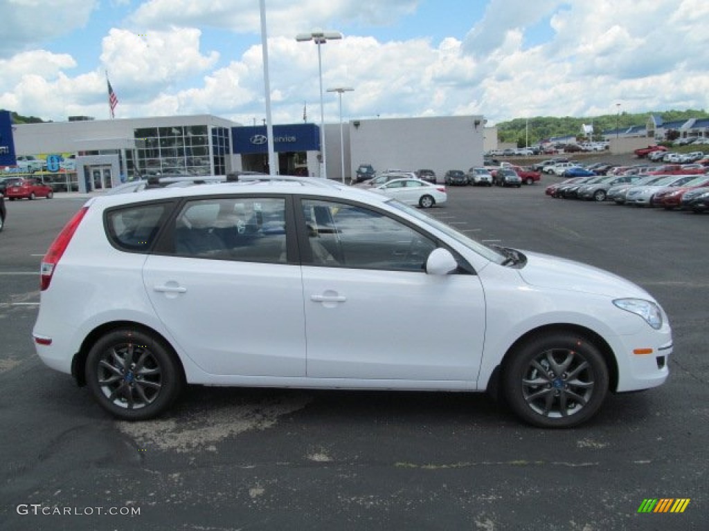 2012 Elantra GLS Touring - Monaco White / Beige photo #2