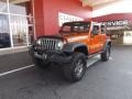 Mango Tango Pearl 2010 Jeep Wrangler Unlimited Mountain Edition 4x4