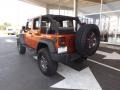 Mango Tango Pearl - Wrangler Unlimited Mountain Edition 4x4 Photo No. 3