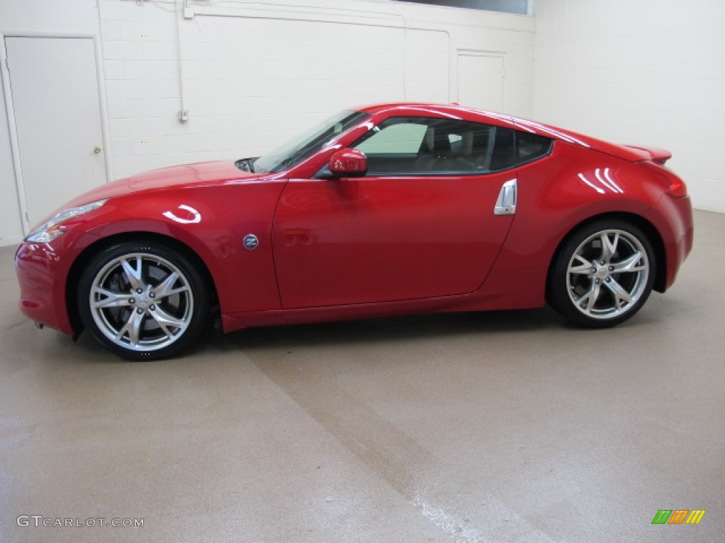 Solid Red 2009 Nissan 370Z Sport Touring Coupe Exterior Photo #66410312