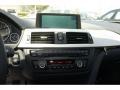 2012 BMW 3 Series Black Interior Controls Photo