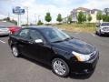 2011 Ebony Black Ford Focus SEL Sedan  photo #1