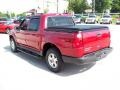 2004 Red Fire Metallic Ford Explorer Sport Trac XLT 4x4  photo #2