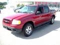 2004 Red Fire Metallic Ford Explorer Sport Trac XLT 4x4  photo #10