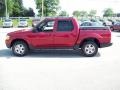 2004 Red Fire Metallic Ford Explorer Sport Trac XLT 4x4  photo #12