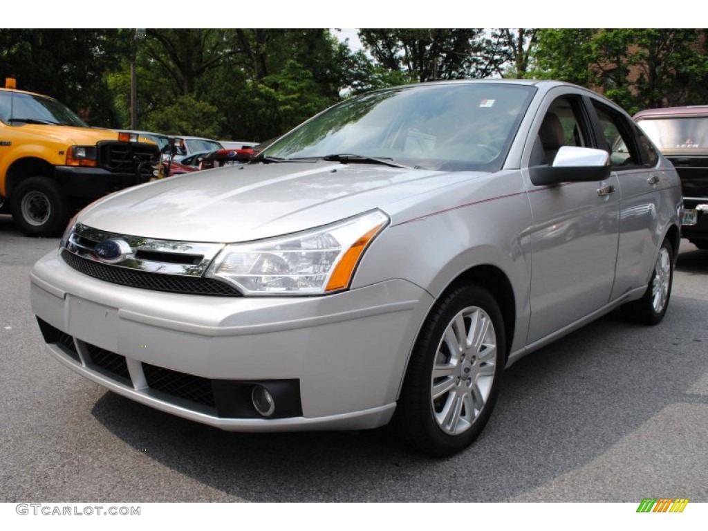 2010 Focus SEL Sedan - Ingot Silver Metallic / Medium Stone photo #1